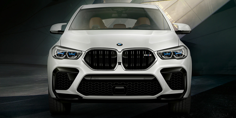 White luxury SUV front view.